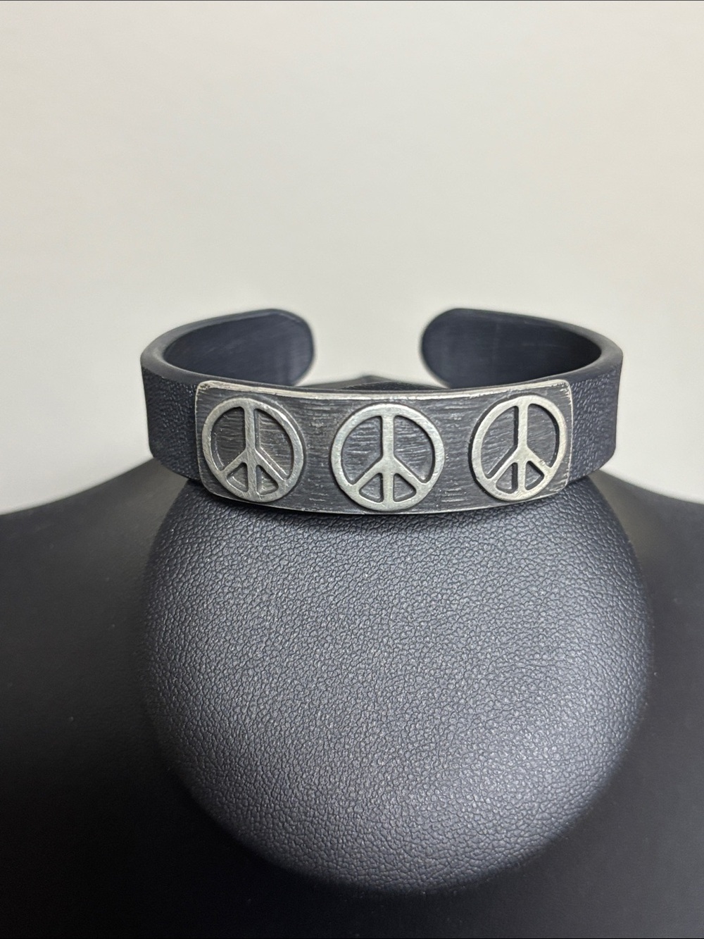 Black Metal Cuff Bracelet with Triple Peace Symbols